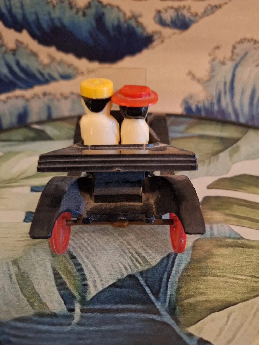 Classic Black Salt & Pepper Car with Red Wheels and Yellow/Red Driver Hats